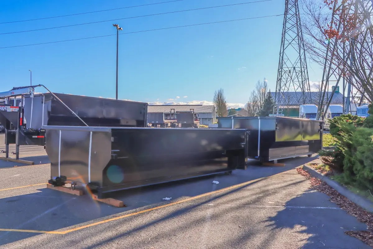 Roll-off dumpster ready for waste disposal at job site for Commercial Dumpster Rental in Baker